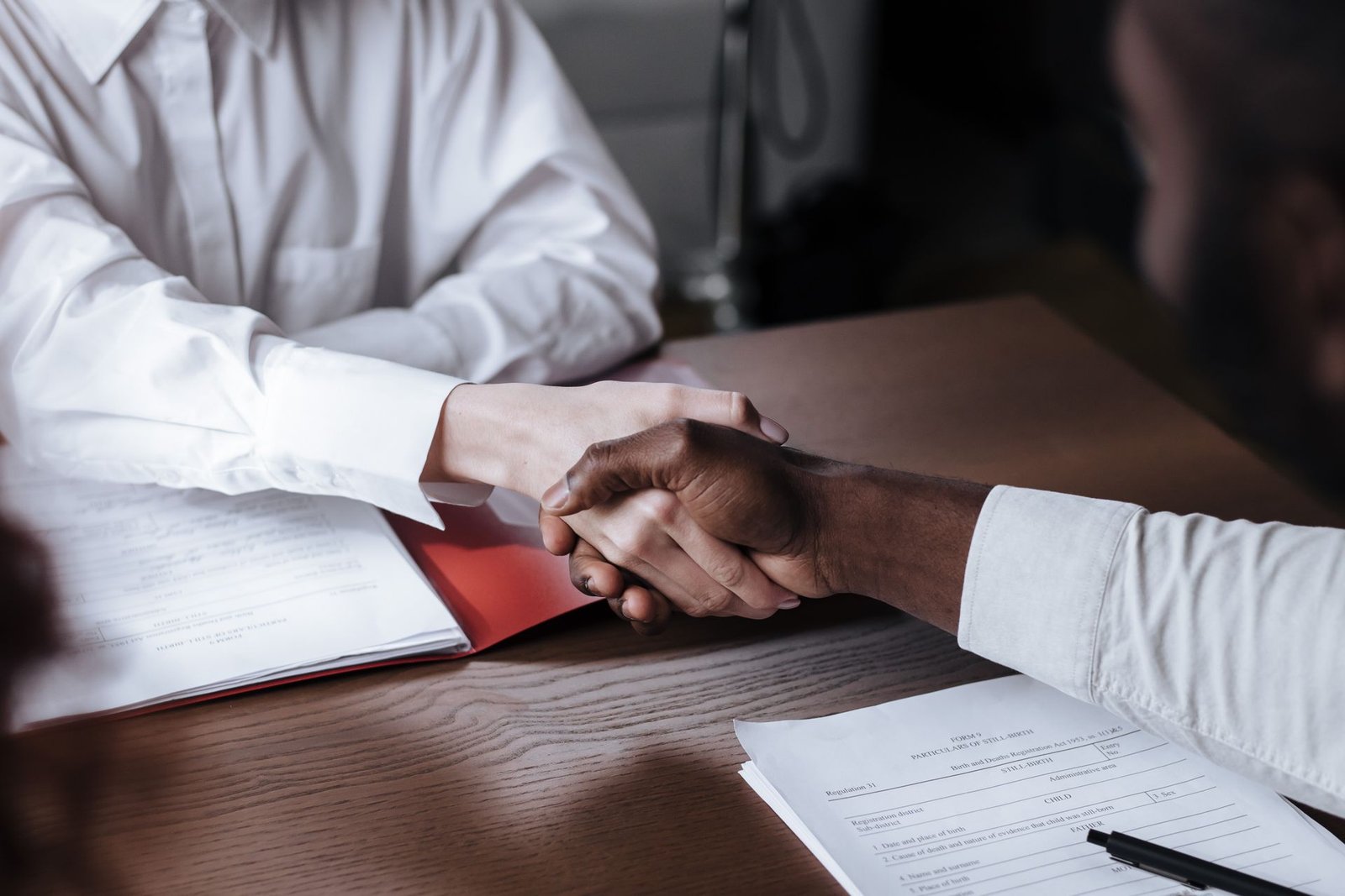 Advisors reviewing financial documents